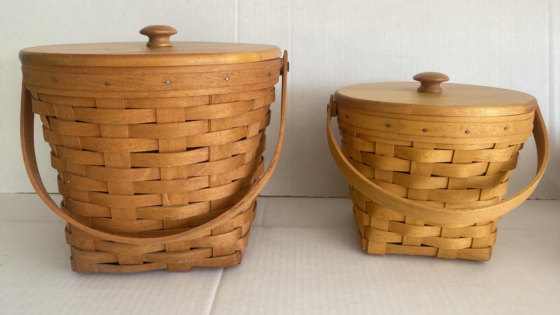 Photo 2 of 2 LONGABERGER  BASKETS WITH WOOD  LID & PLASTIC INSERT LARGEST 9” x 9”