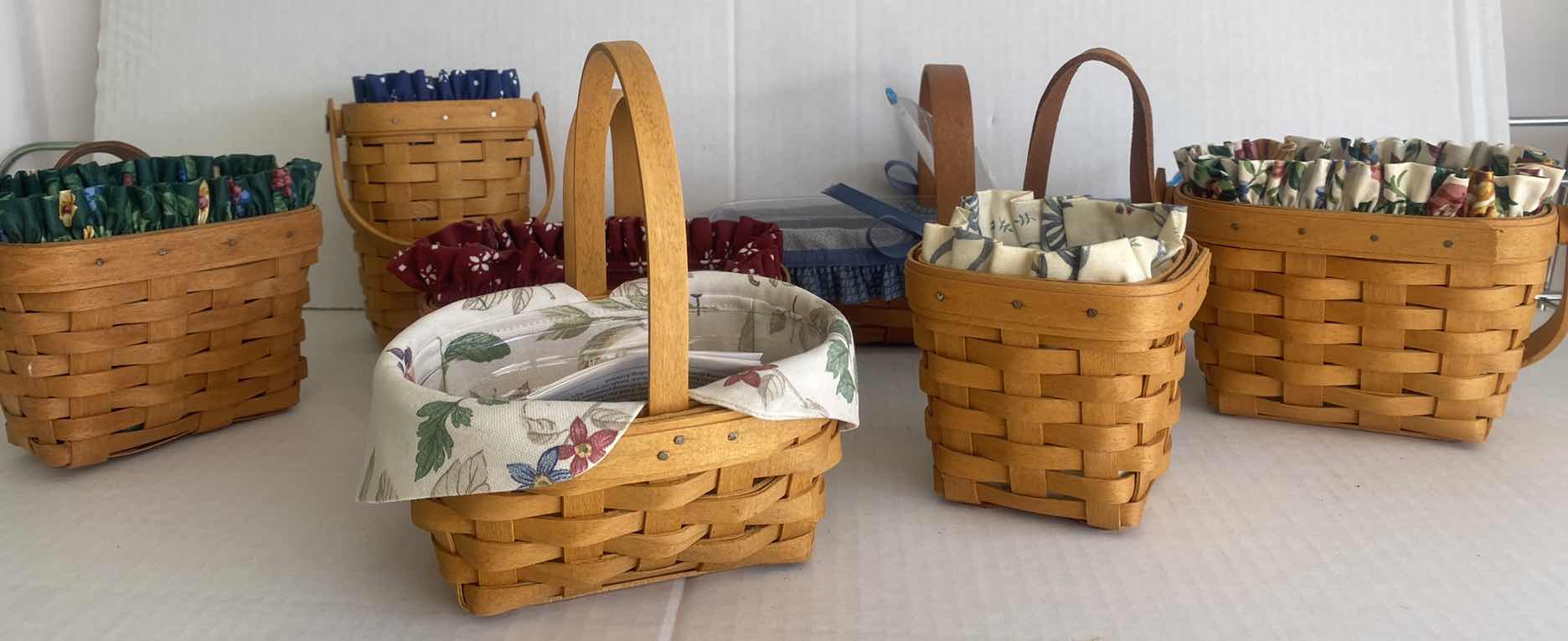 Photo 1 of 7 LONGABERGER  BASKETS SOME WITH REMOVABLE FABRIC INSERTS LARGEST 10” x 3” excluding handle