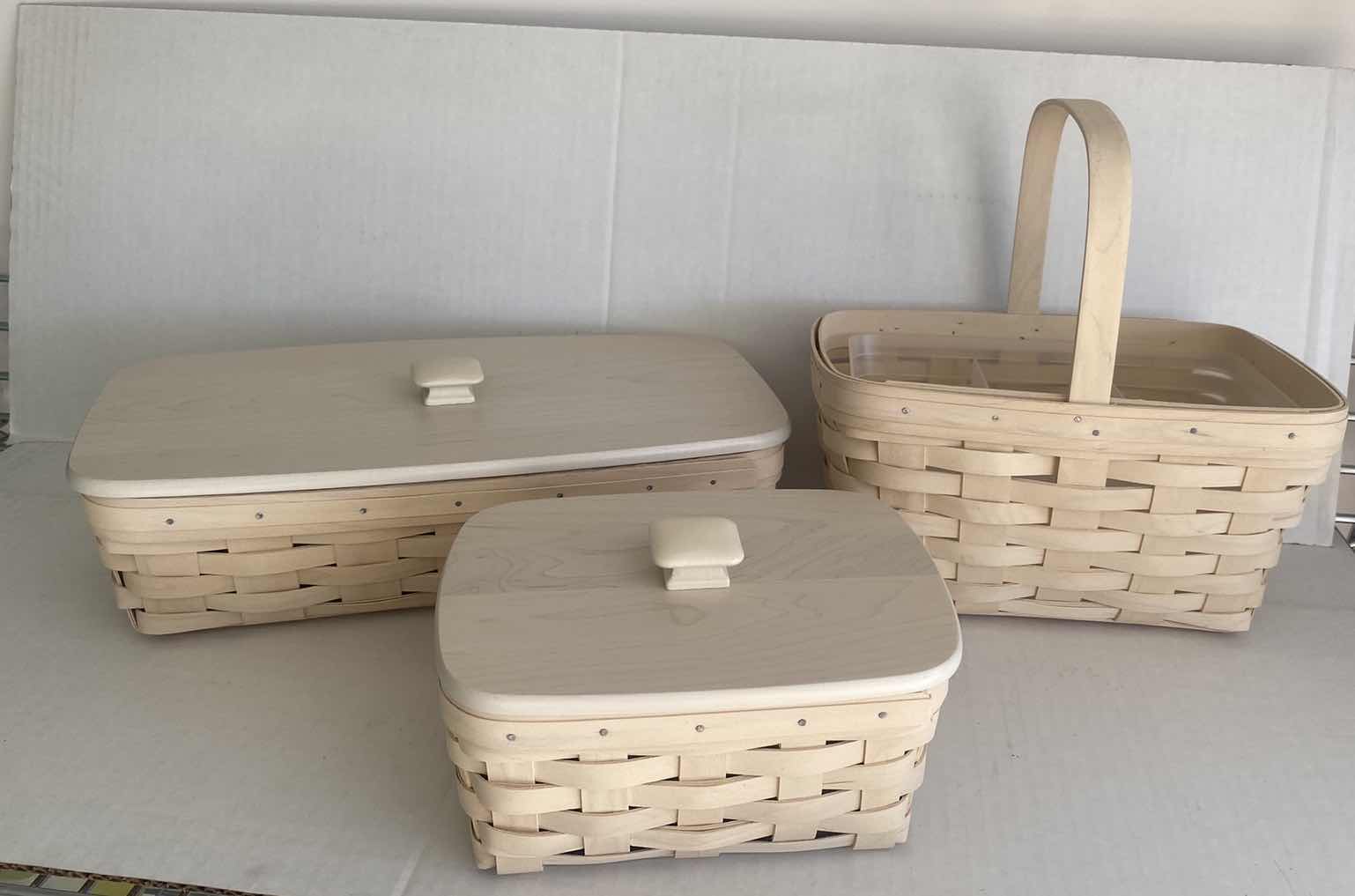 Photo 1 of 3 LONGABERGER  BASKETS WITH 2 LIDS LARGEST 14“ x 4“ H4”