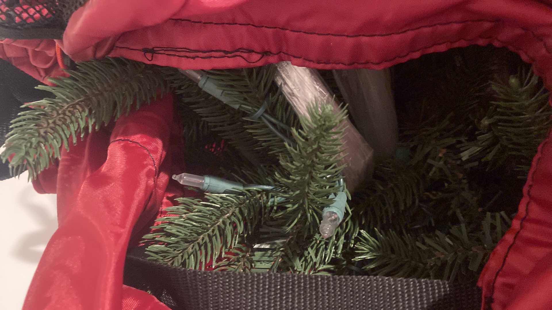 Photo 1 of 7’ ARTIFICIAL PRE LIT CLEAR LIGHTS CHRISTMAS TREE IN STORAGE BAG, SHORT NEEDLES