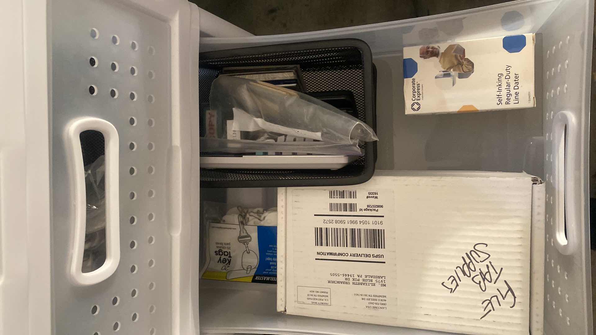 Photo 1 of 6 DRAWER PLASTIC STORAGE WITH OFFICE SUPPLIES ON SMALL CARPET DOLLIE