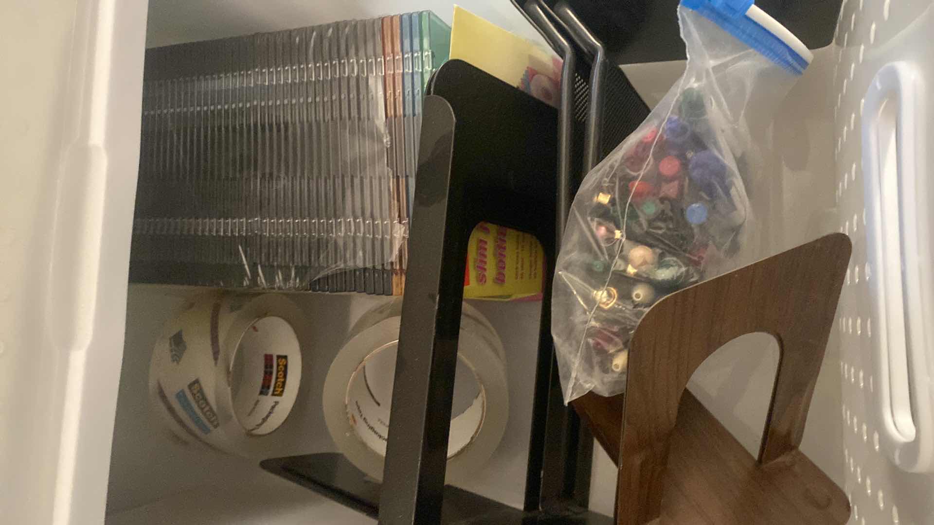 Photo 1 of 6 DRAWER PLASTIC STORAGE WITH OFFICE SUPPLIES ON SMALL CARPET DOLLIE