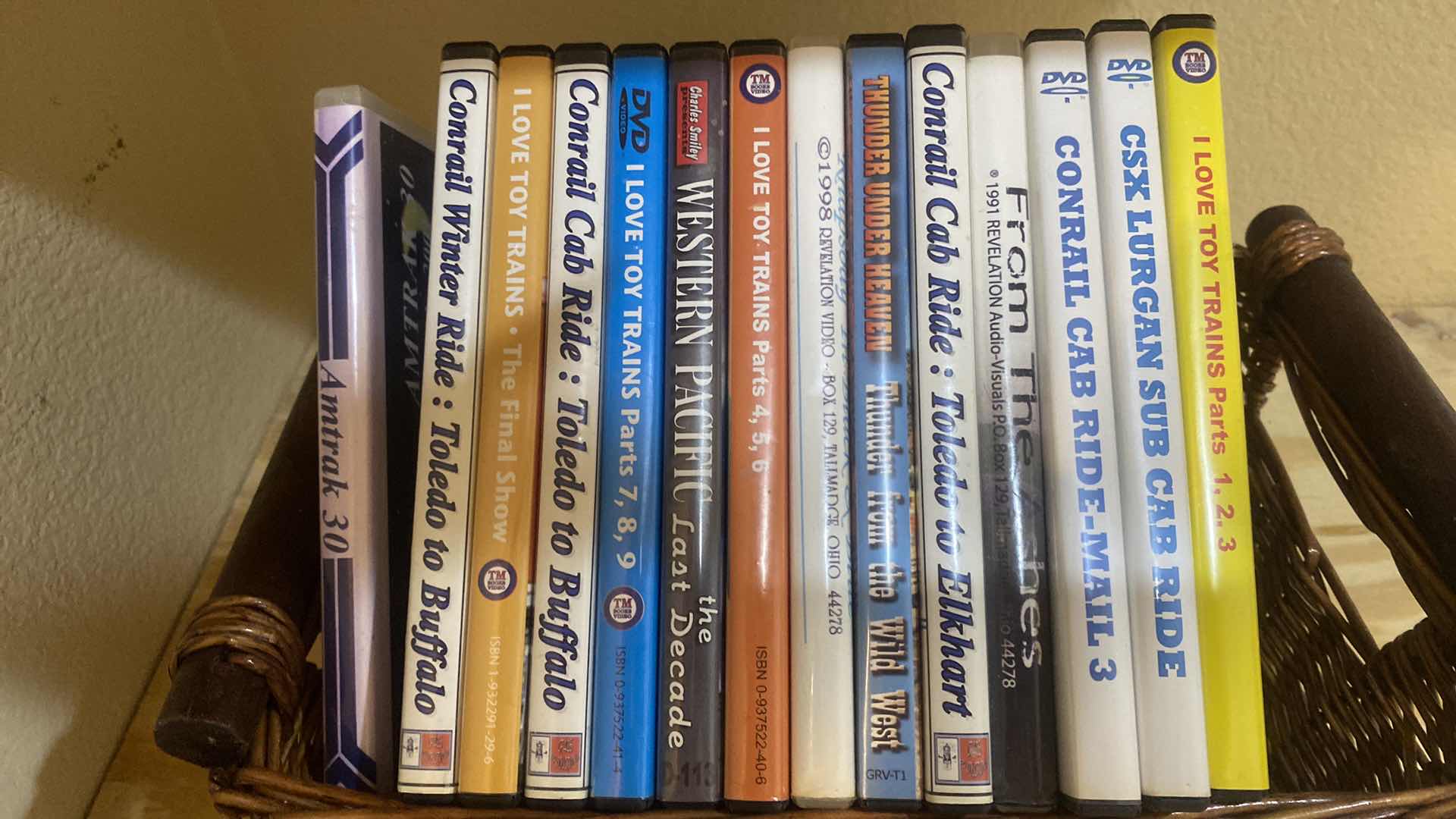 Photo 1 of BASKET OF DVDS