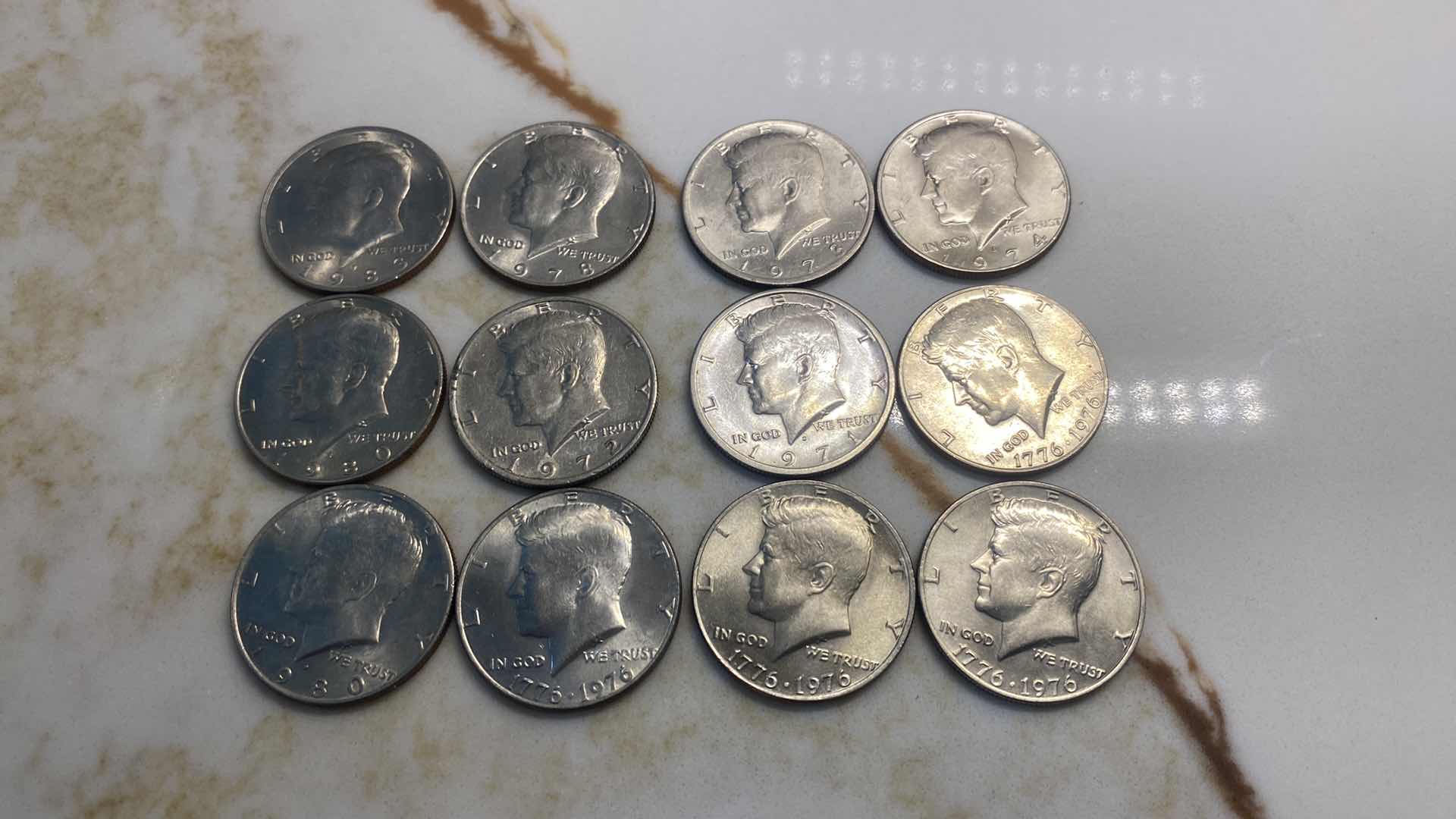 Photo 1 of 12 - KENNEDY HALF DOLLARS - 75% COPPER 25% NICKEL