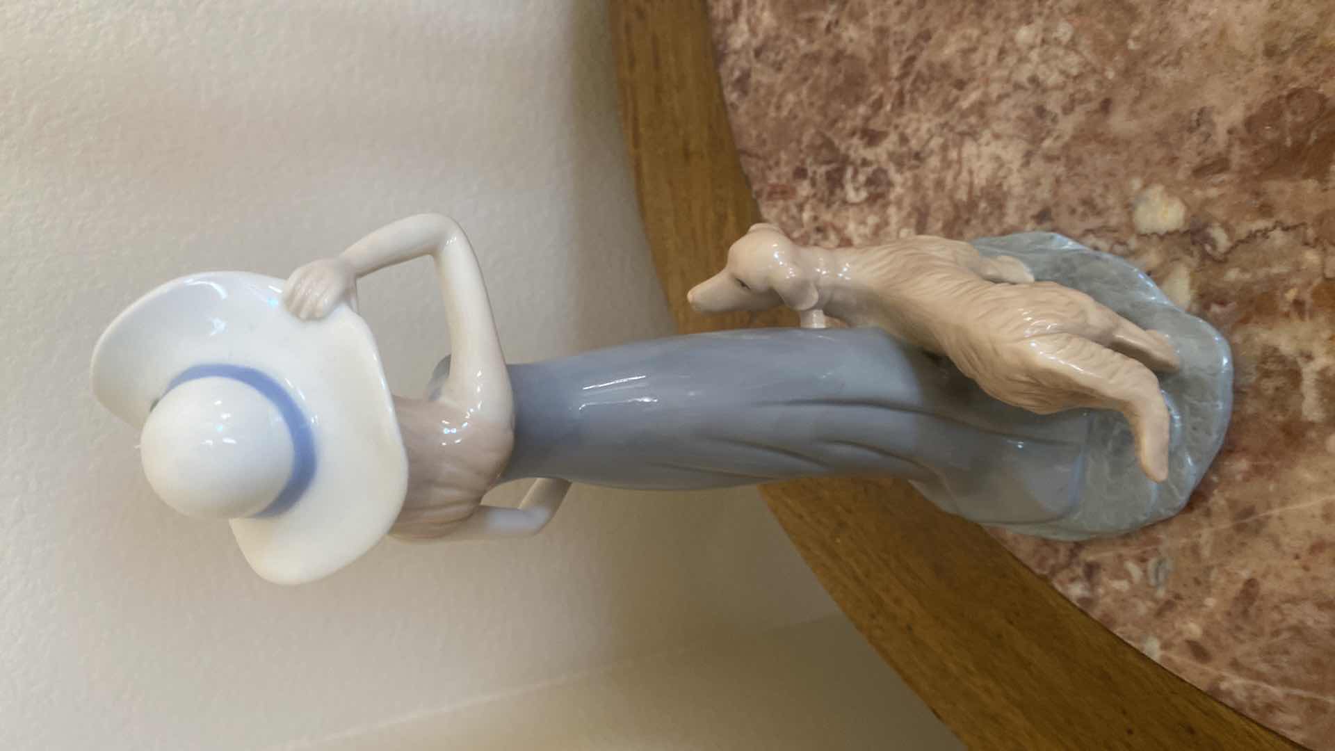 Photo 1 of CERAMIC FIGURINES WITH DOG & RESIN FIGURINE H14”