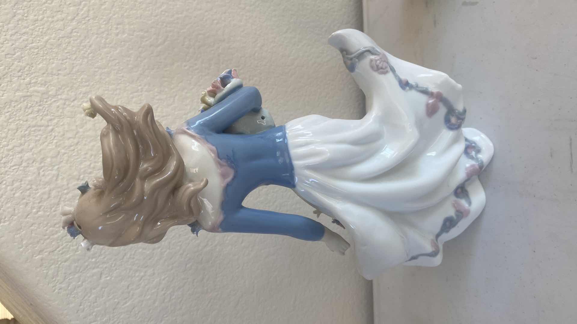 Photo 1 of PAIR OF CERAMIC FIGURINES H14”