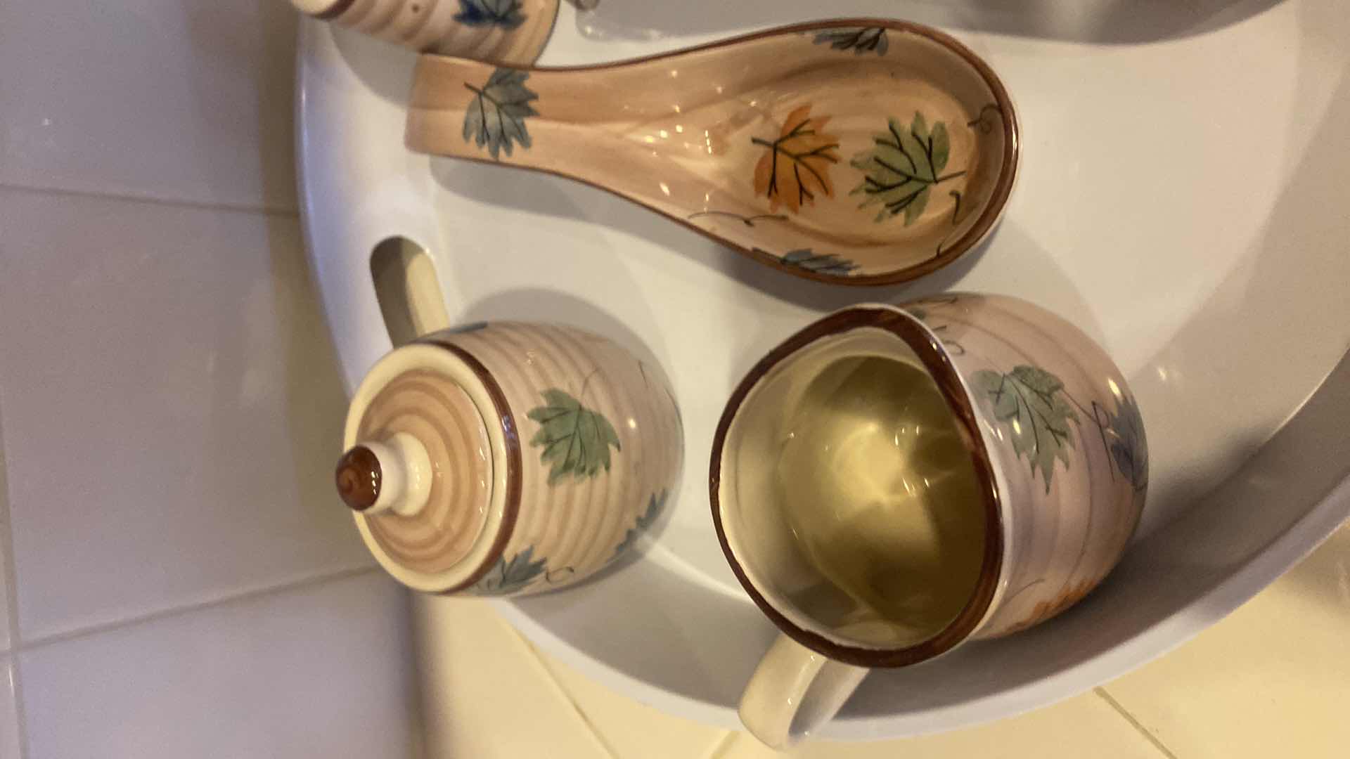 Photo 1 of PLASTIC TRAY WITH CERAMIC SPOON RESTS SEASONING SHAKERS CREAM & SUGAR