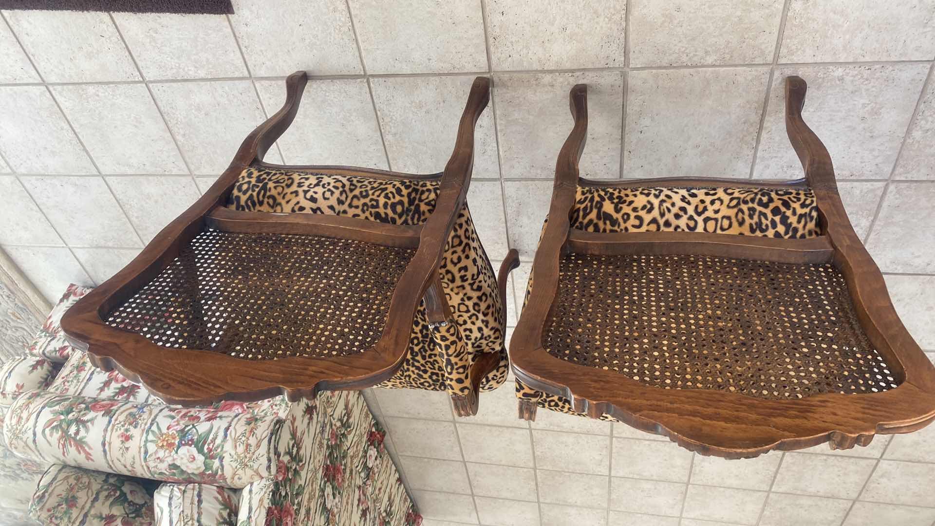 Photo 1 of 2 - WOOD LEOPARD PRINT WITH CANE BACK OCCASIONAL CHAIRS (1 ADDITIONAL SET OF 2 AVAILABLE SOLD SEPARATELY)