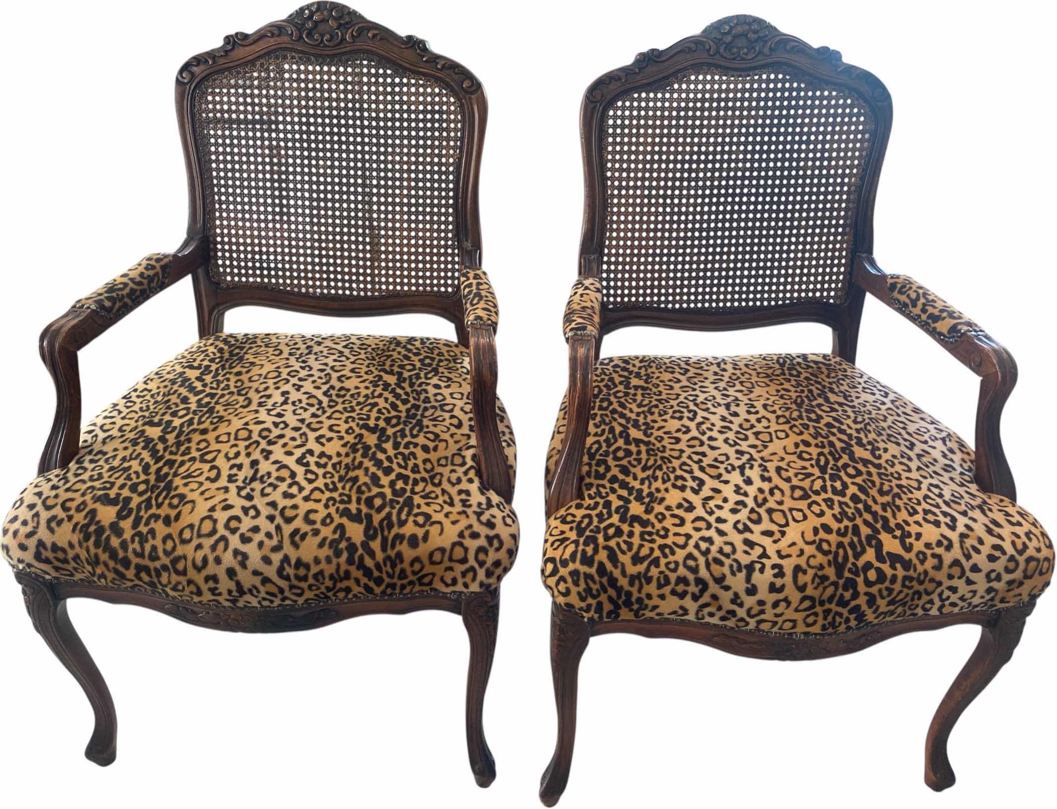 Photo 1 of 2 - WOOD LEOPARD PRINT WITH CANE BACK OCCASIONAL CHAIRS (1 ADDITIONAL SET OF 2 AVAILABLE SOLD SEPARATELY)