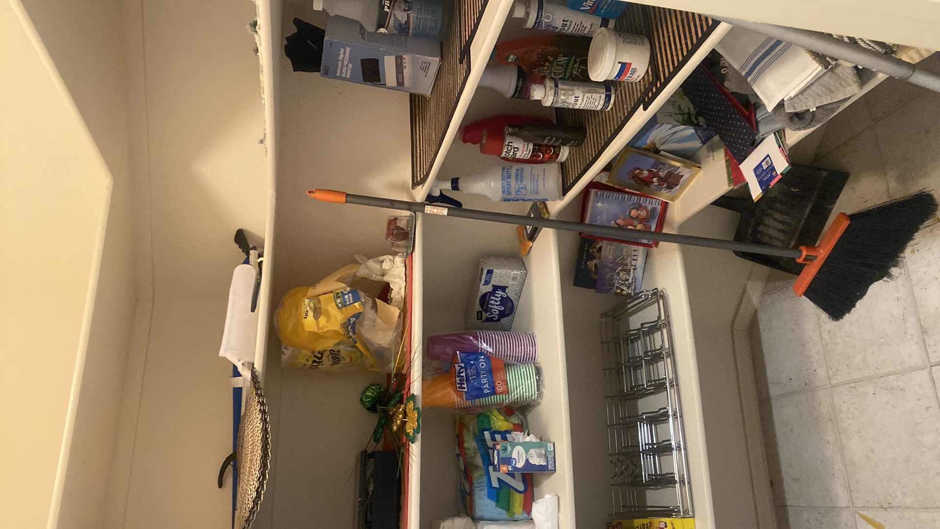 Photo 1 of CONTENTS OF CLOSET - PAPER GOODS, CLEANING SUPPLIES & LINENS