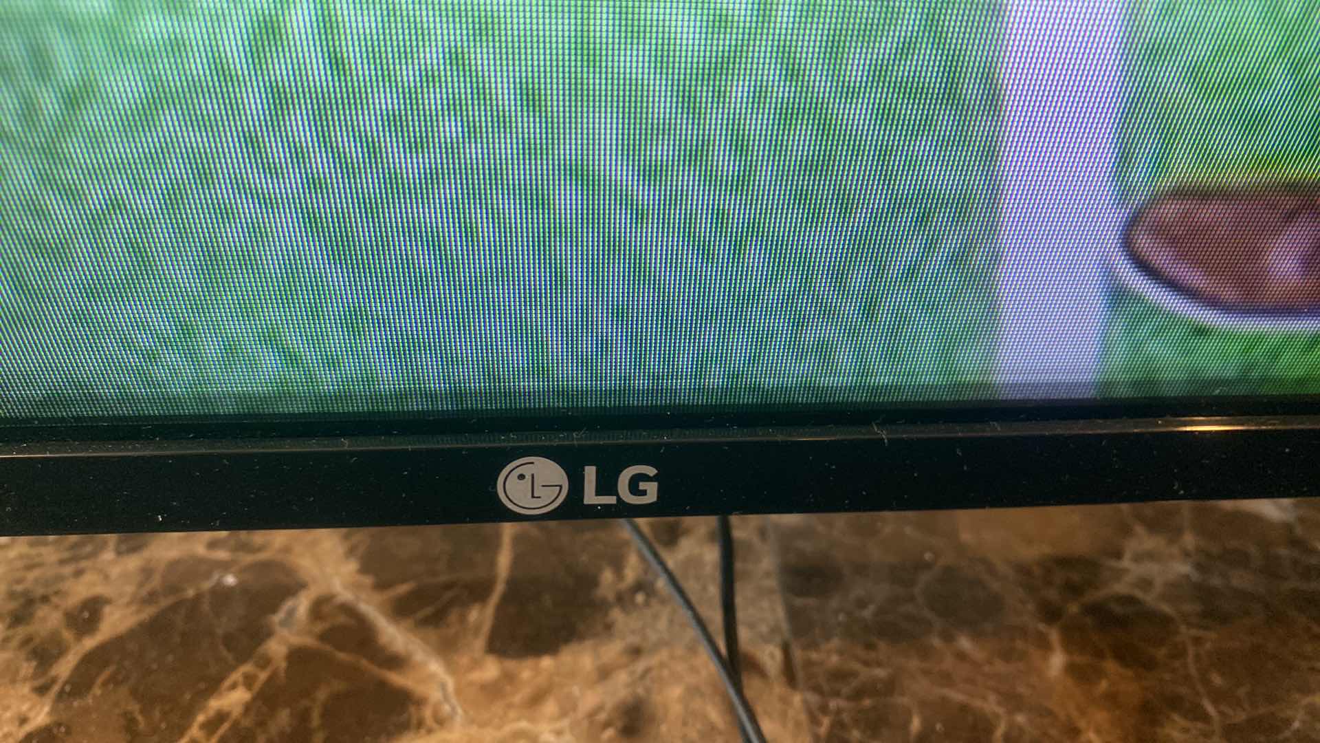 Photo 1 of 48” LG TV WITH REMOTE 2017 (sound bar sold separately)