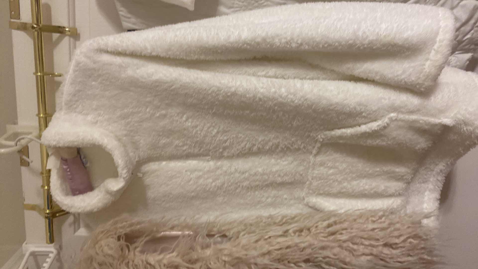 Photo 1 of 3 - WOMENS SIZE EST.  XL VESTS & JACKET