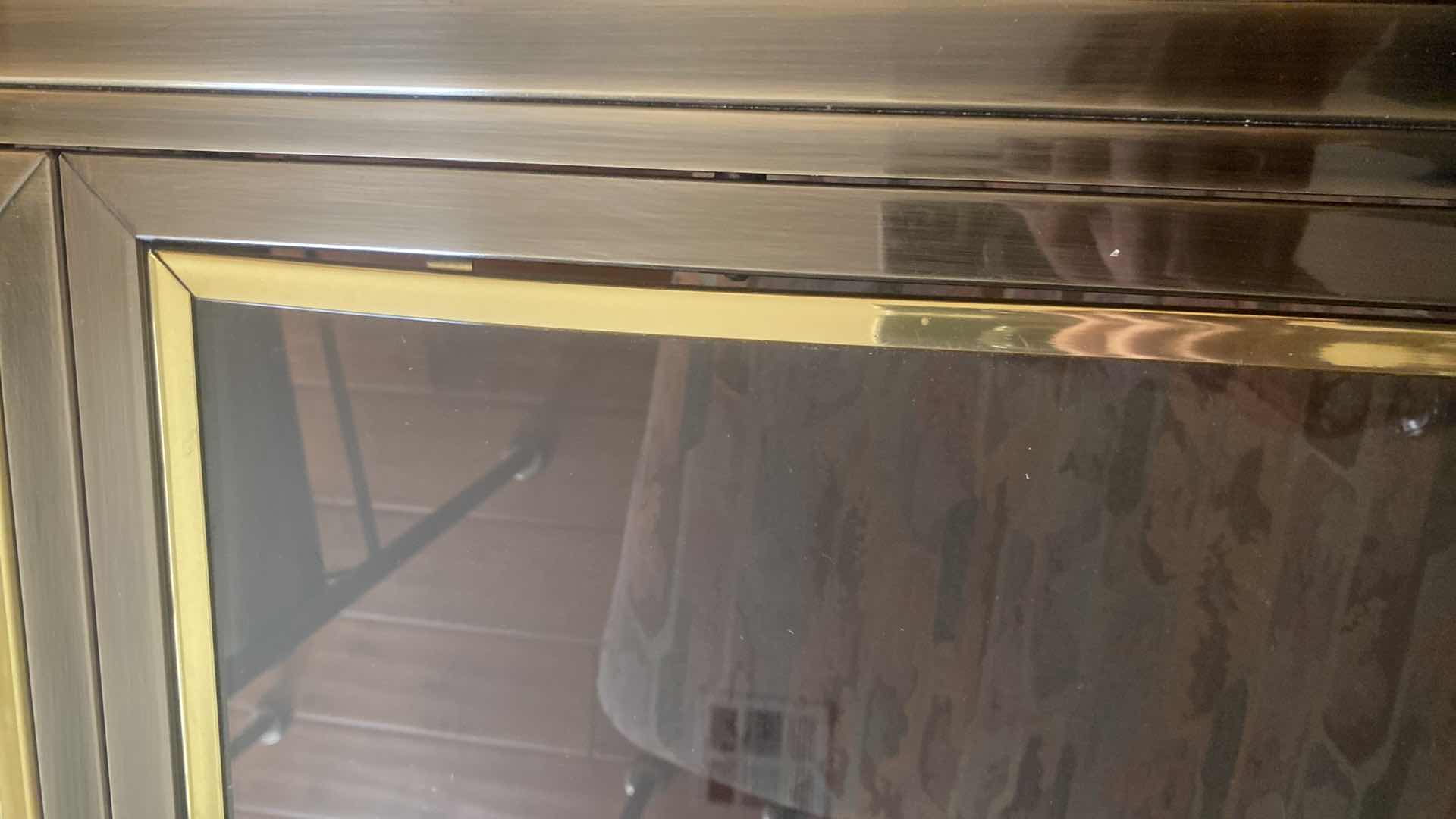 Photo 1 of 7 PIECE SMOKED GLASS AND HEAVY METAL TABLE, WITH 6 CHAIRS (2 ARM CHAIRS 4 DINING CHAIRS, TABLE EXPANDS) 5’ X 40” H30” EXPANDS TO 10’