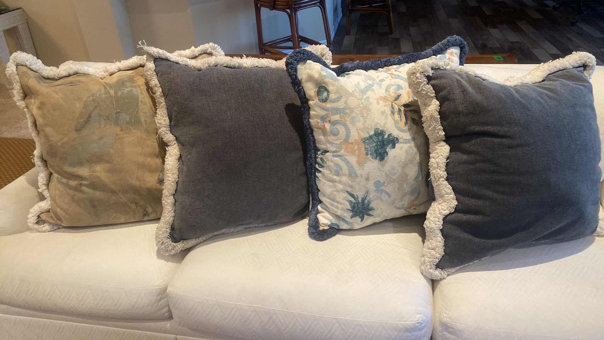 Photo 1 of 84” WHITE UPHOLSTERED 3 CUSHION SOFA WITH 4 22” TOSS PILLOWS