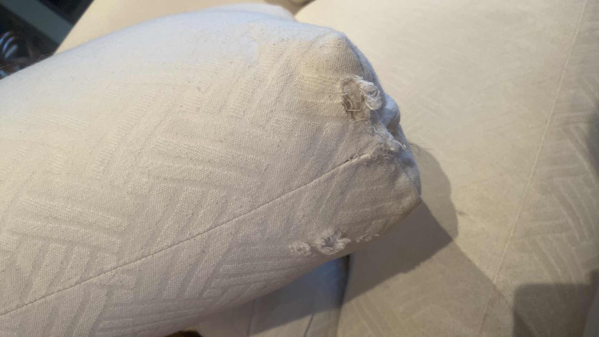 Photo 1 of 84” WHITE UPHOLSTERED 3 CUSHION SOFA WITH 4 22” TOSS PILLOWS