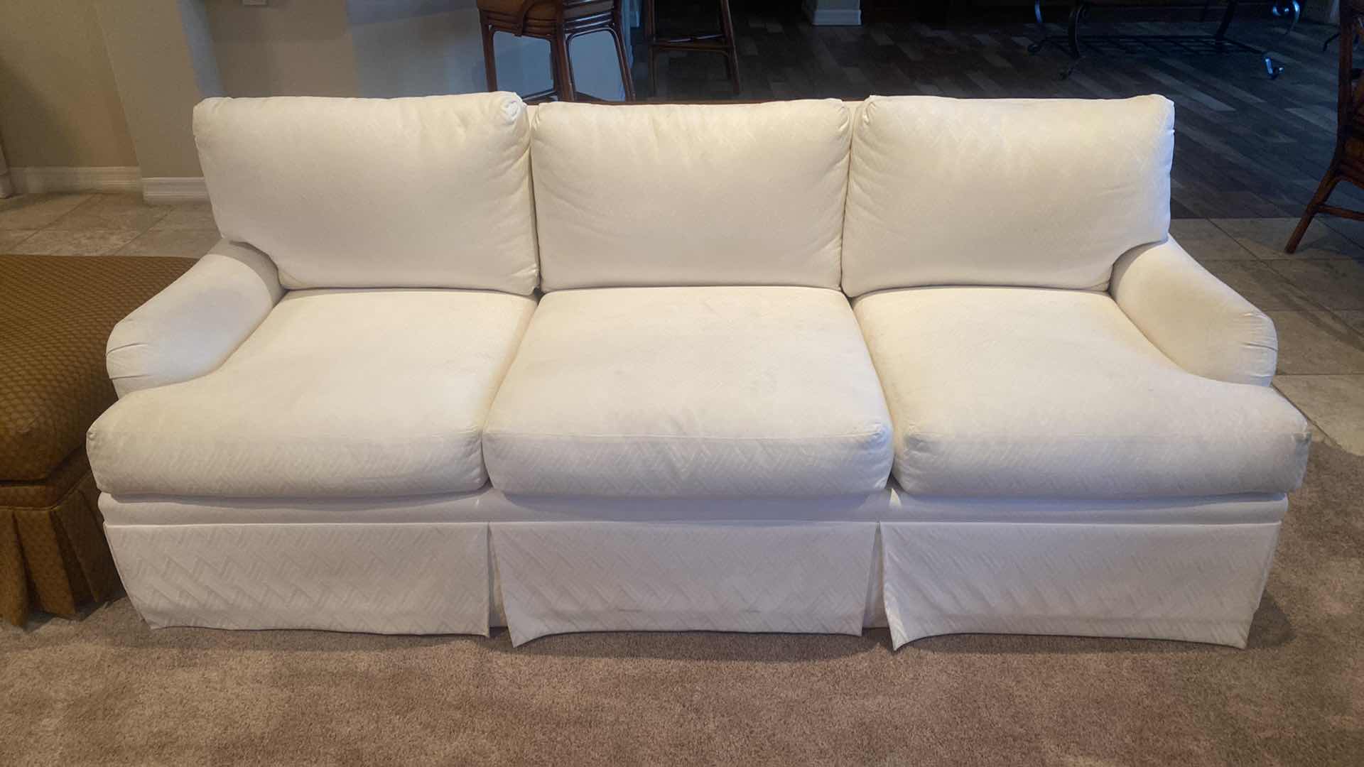 Photo 1 of 84” WHITE UPHOLSTERED 3 CUSHION SOFA WITH 4 22” TOSS PILLOWS