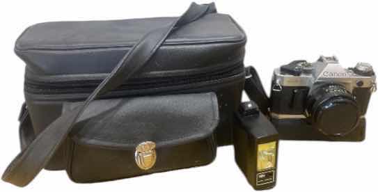 Photo 1 of VINTAGE CANON AE ONE PROGRAM 35 MM CAMERA WITH FLASH AND BAG
