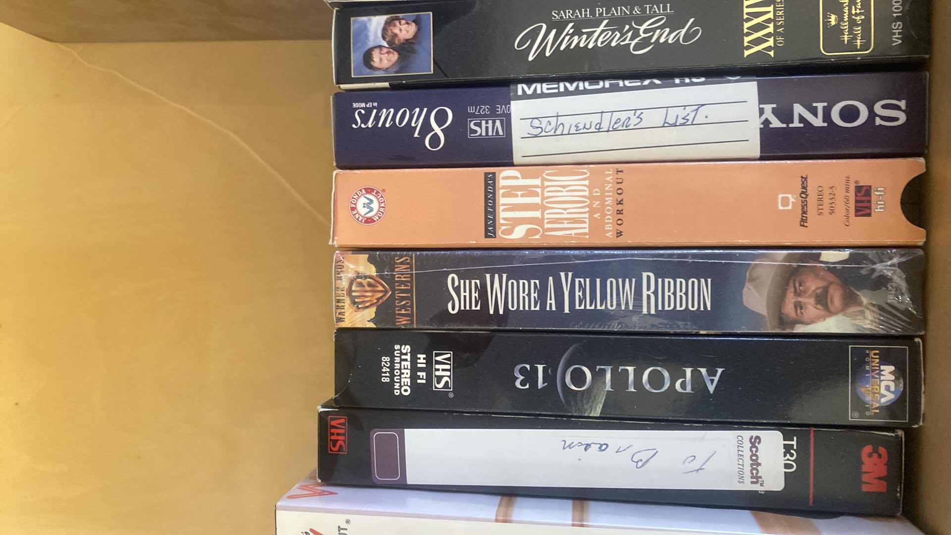 Photo 1 of CONTENTS OF DRAWER, VHS MOVIES, PUZZLES, AND FAUX BOOK DECOR