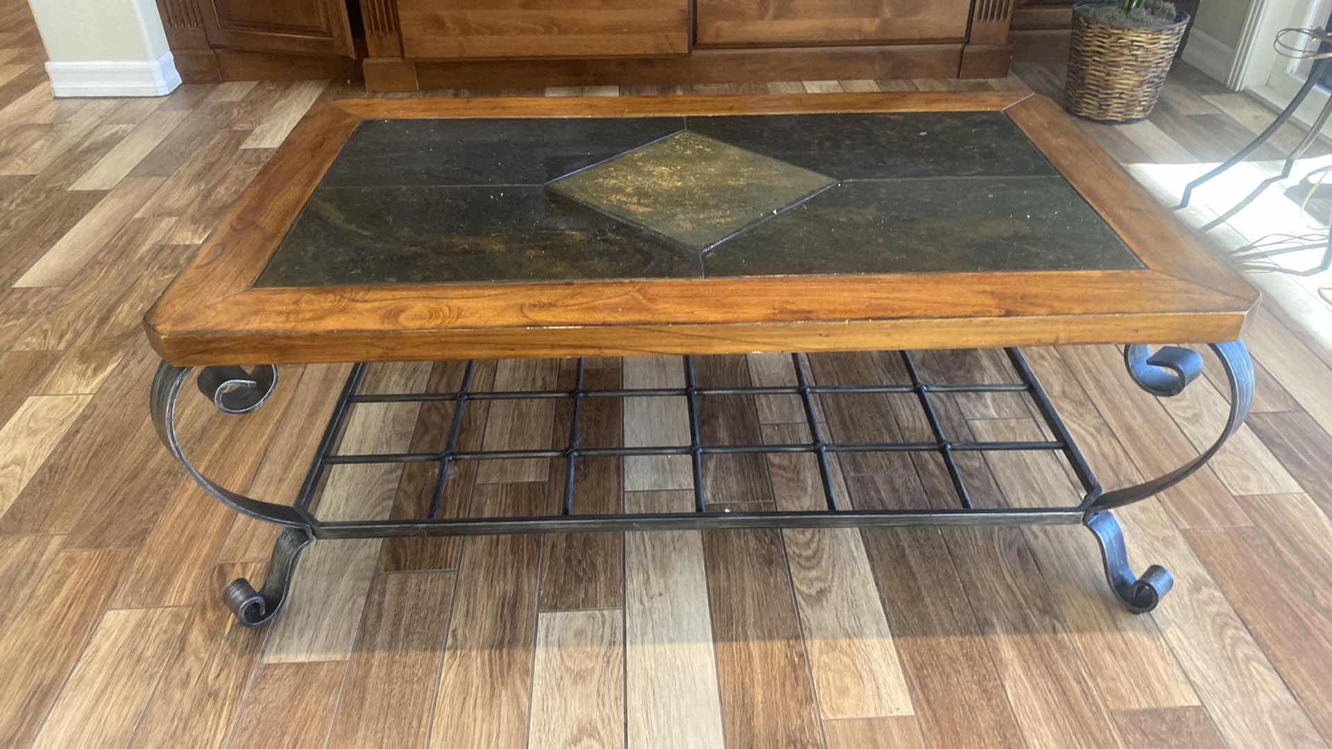 Photo 1 of IRON COFFEE TABLE WITH WOOD AND TILE TOP 50” X 30” H19 1/2”