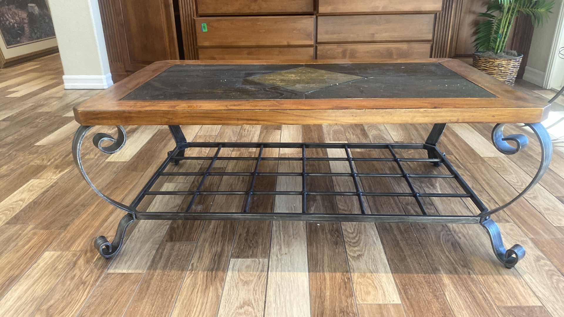 Photo 1 of IRON COFFEE TABLE WITH WOOD AND TILE TOP 50” X 30” H19 1/2”
