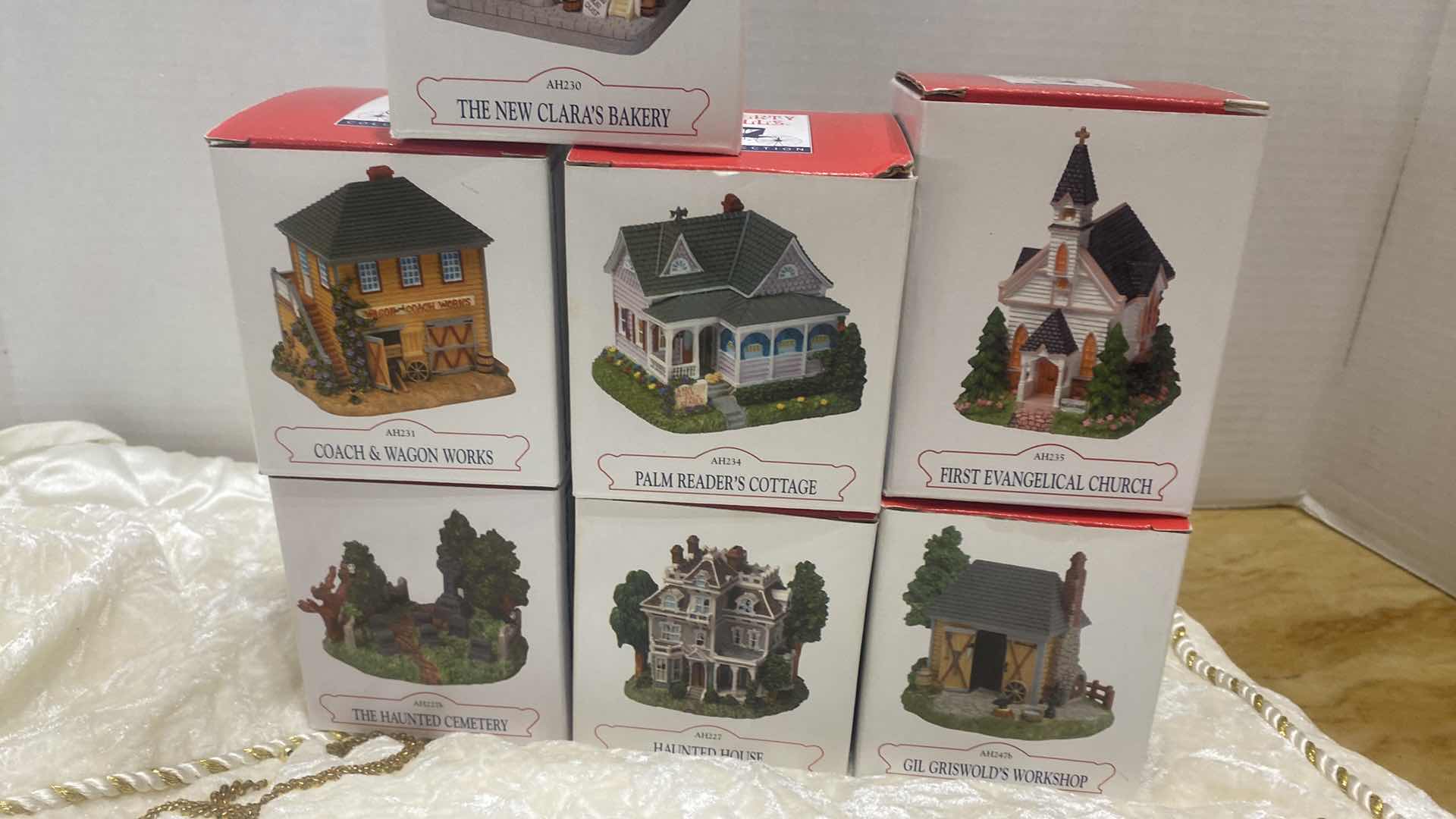 Photo 1 of SEVEN LIBERTY FALLS, COLLECTION, BUILDINGS AND GOLD AND WHITE CHRISTMAS TREE SKIRT