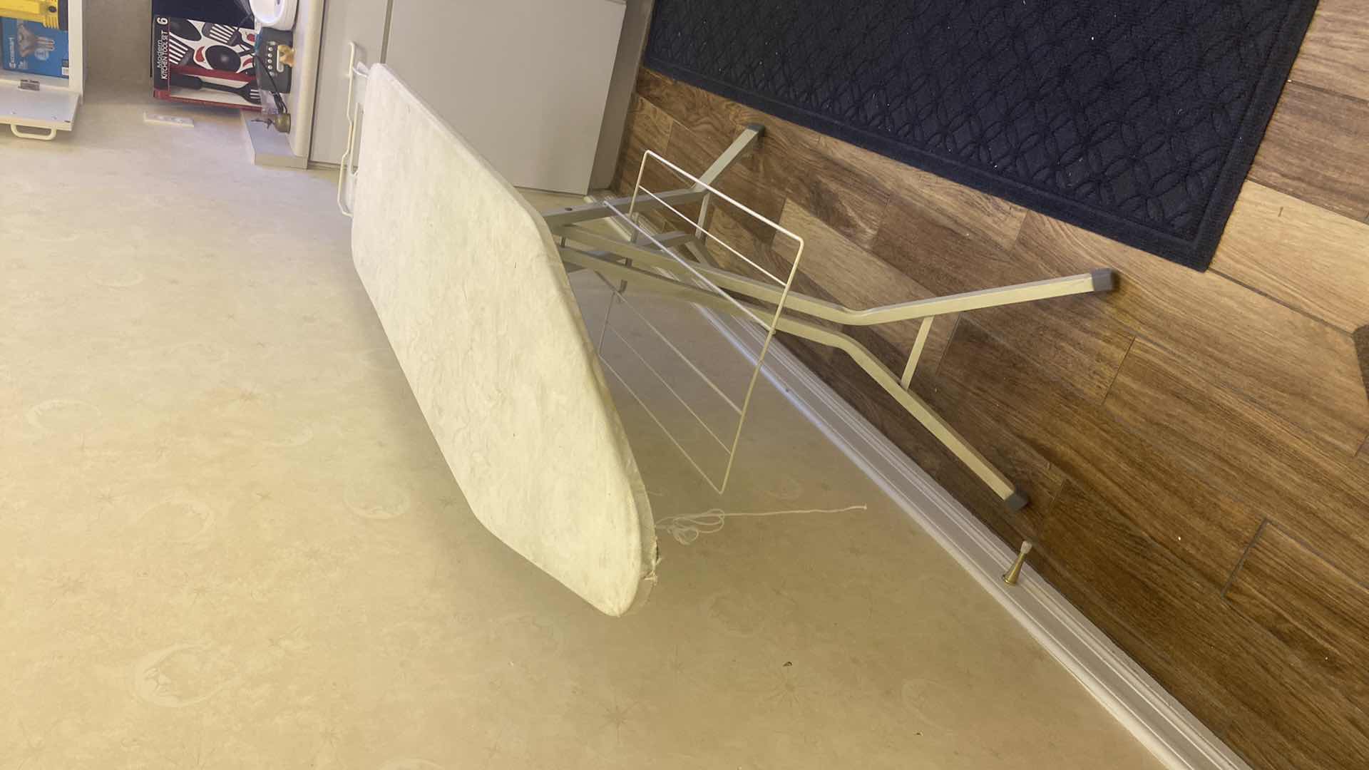 Photo 1 of IRONING BOARD WITH SHELF UNDERNEATH AND IRON HOLDER