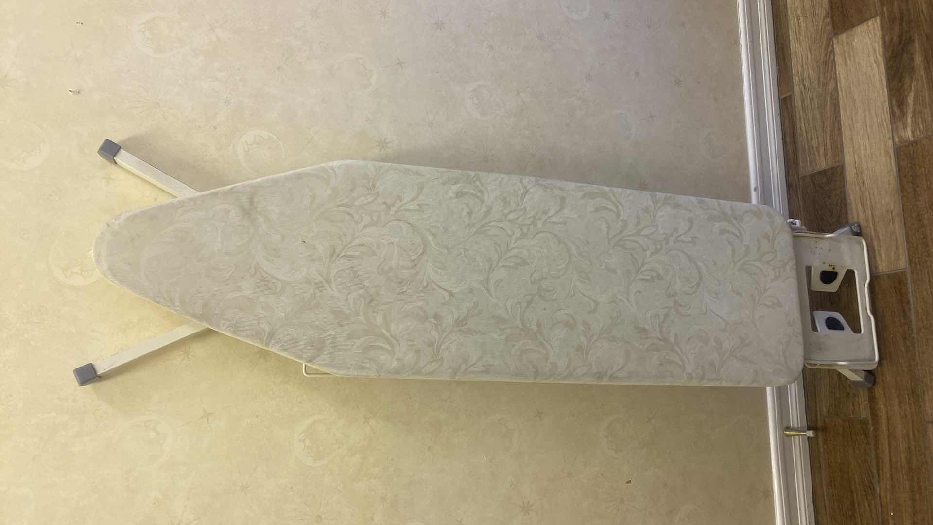 Photo 1 of IRONING BOARD WITH SHELF UNDERNEATH AND IRON HOLDER