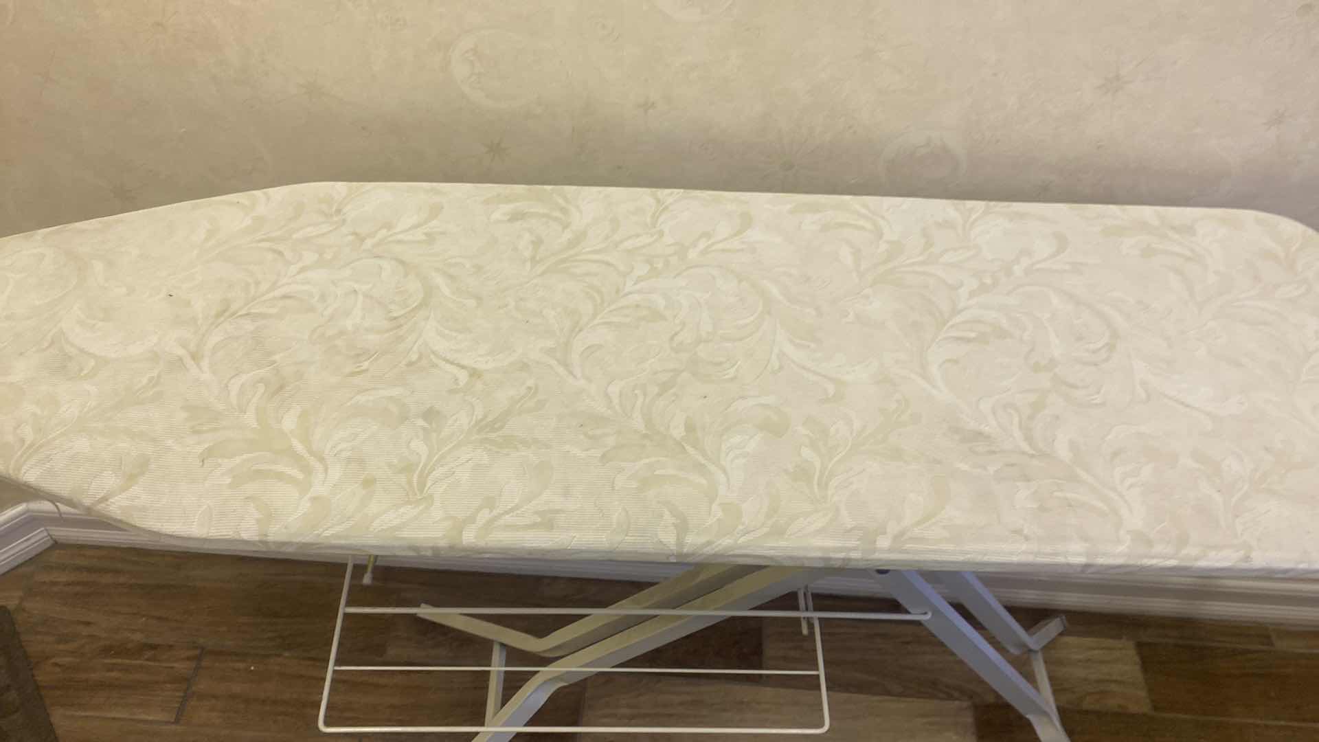 Photo 1 of IRONING BOARD WITH SHELF UNDERNEATH AND IRON HOLDER