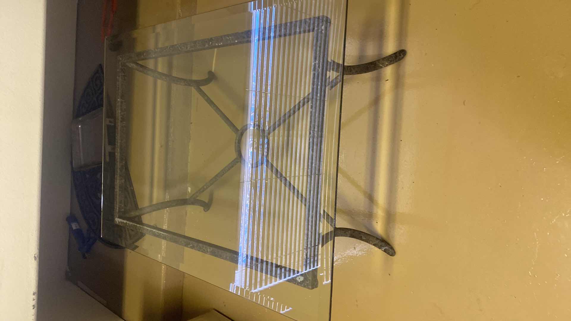 Photo 1 of METAL TABLE WITH GLASS TOP 42“ x 30“ H 17”