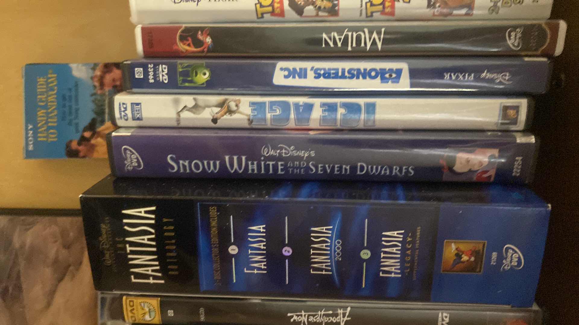 Photo 1 of CONTENTS OF DRAWER-DVDS AND CDS