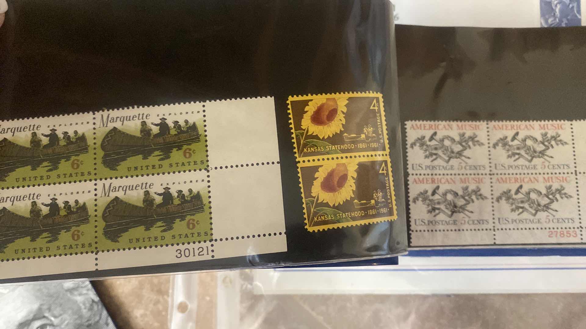 Photo 1 of STAMP COLLECTION ALBUM AND TWO OFFICIAL CENTENNIAL SEAL STATUE OF LIBERTY RESTORATION