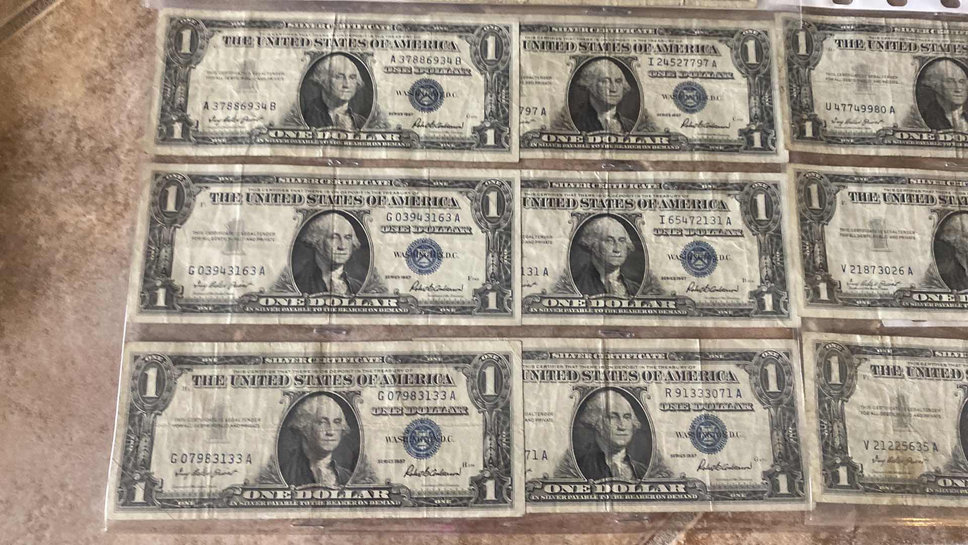 Photo 1 of 19-VINTAGE 1957 CIRCULATED SILVER CERTIFICATES ONE DOLLAR BILLS