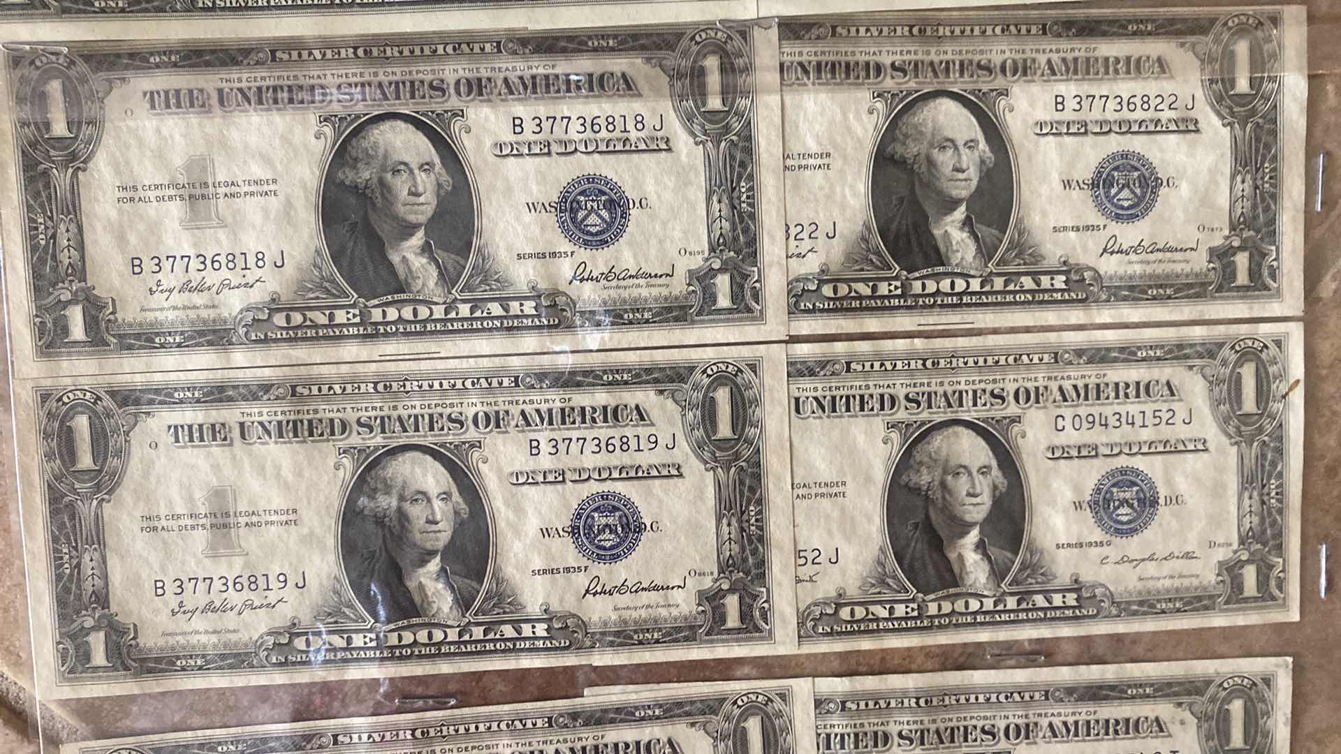 Photo 1 of VINTAGE 1957 & 1935 CIRCULATED SILVER CERTIFICATES ONE DOLLAR BILLS