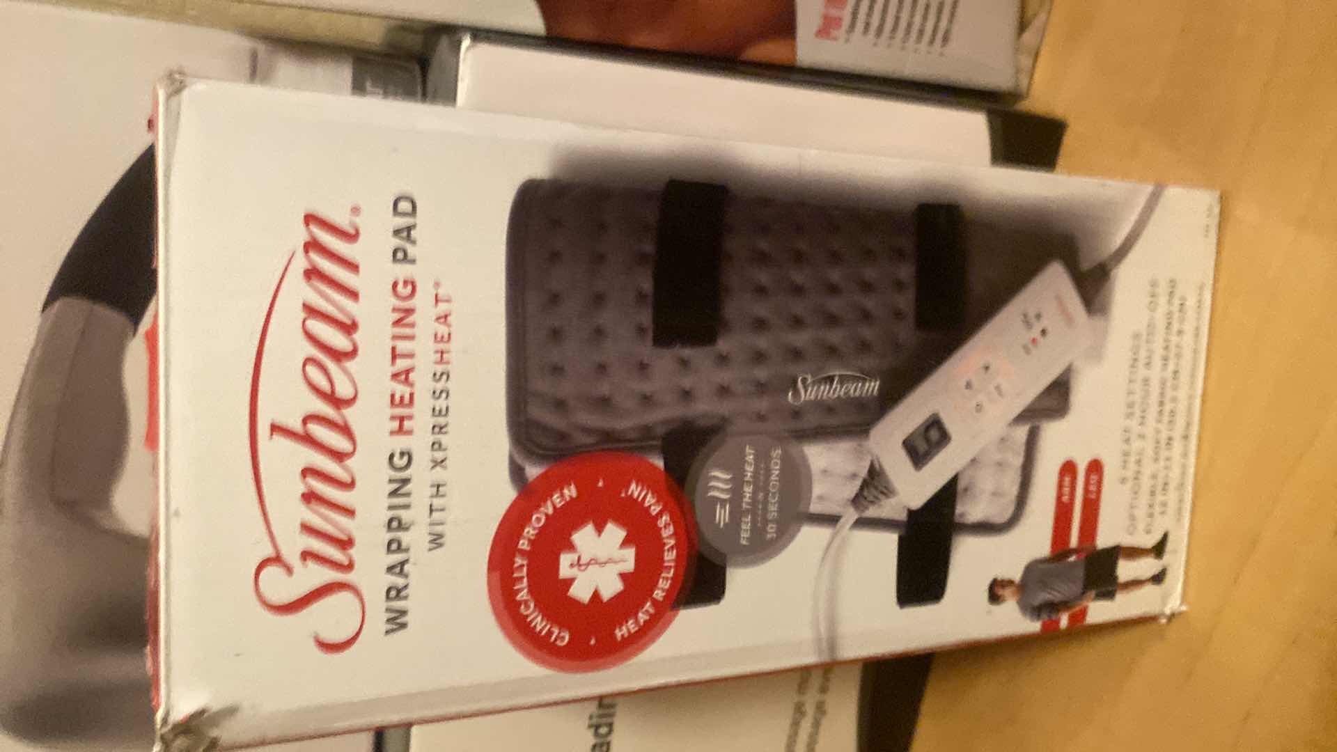 Photo 1 of HEATING PADS AND MASSAGERS
