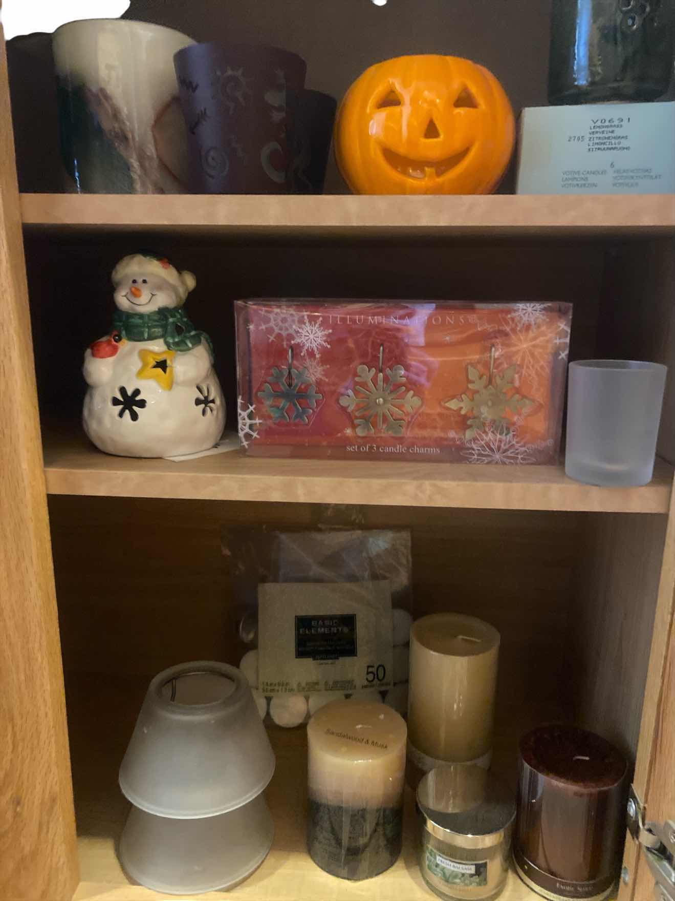 Photo 1 of CONTENTS OF CABINET CANDLES & CANDLE ACCESSORIES