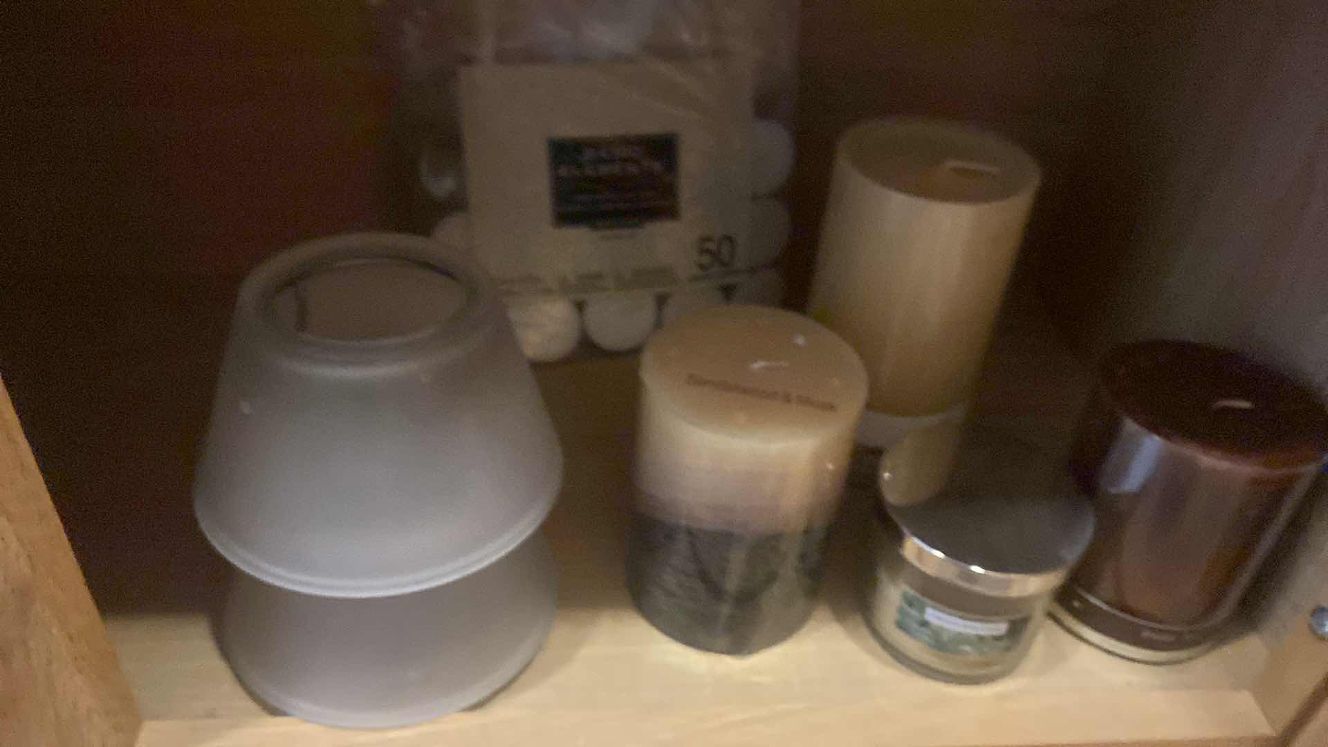 Photo 1 of CONTENTS OF CABINET CANDLES & CANDLE ACCESSORIES