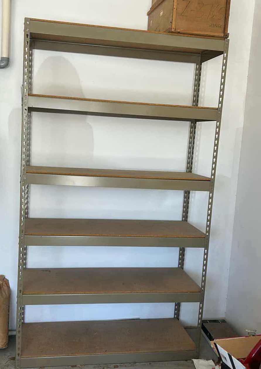 Photo 1 of METAL GARAGE SHELVING UNIT WITH HEAVY PARTICLE BOARD SHELVES 48.5” x 18.5” x H7’