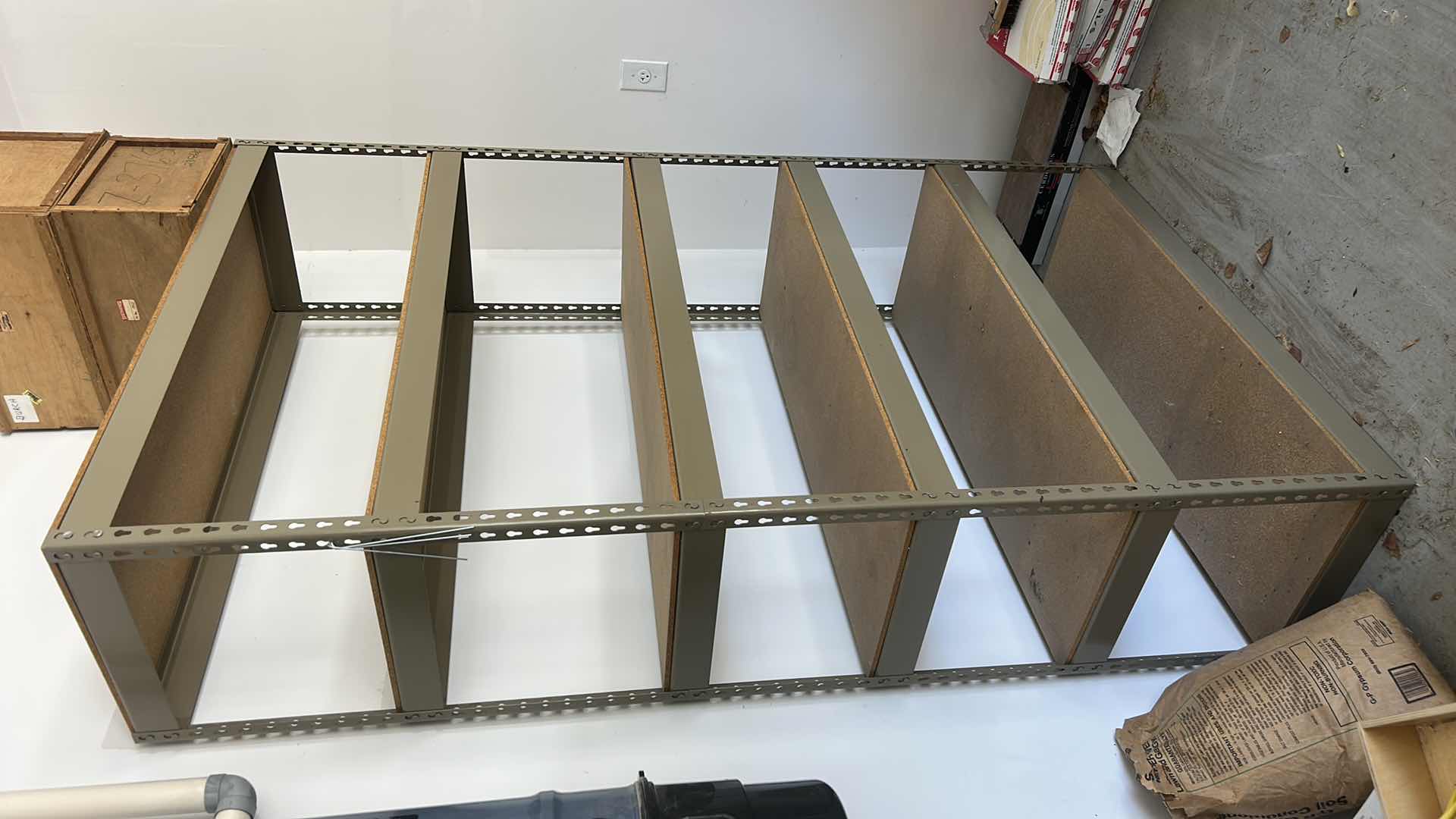 Photo 1 of METAL GARAGE SHELVING UNIT WITH HEAVY PARTICLE BOARD SHELVES 48.5” x 18.5” x H7’