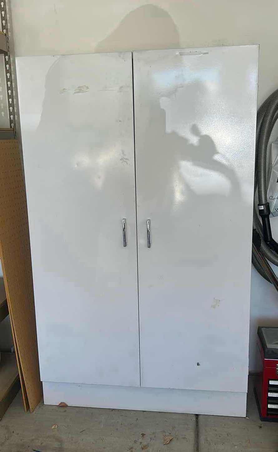 Photo 1 of WHITE METAL STORAGE CABINET 3’ x 15“ X H5‘