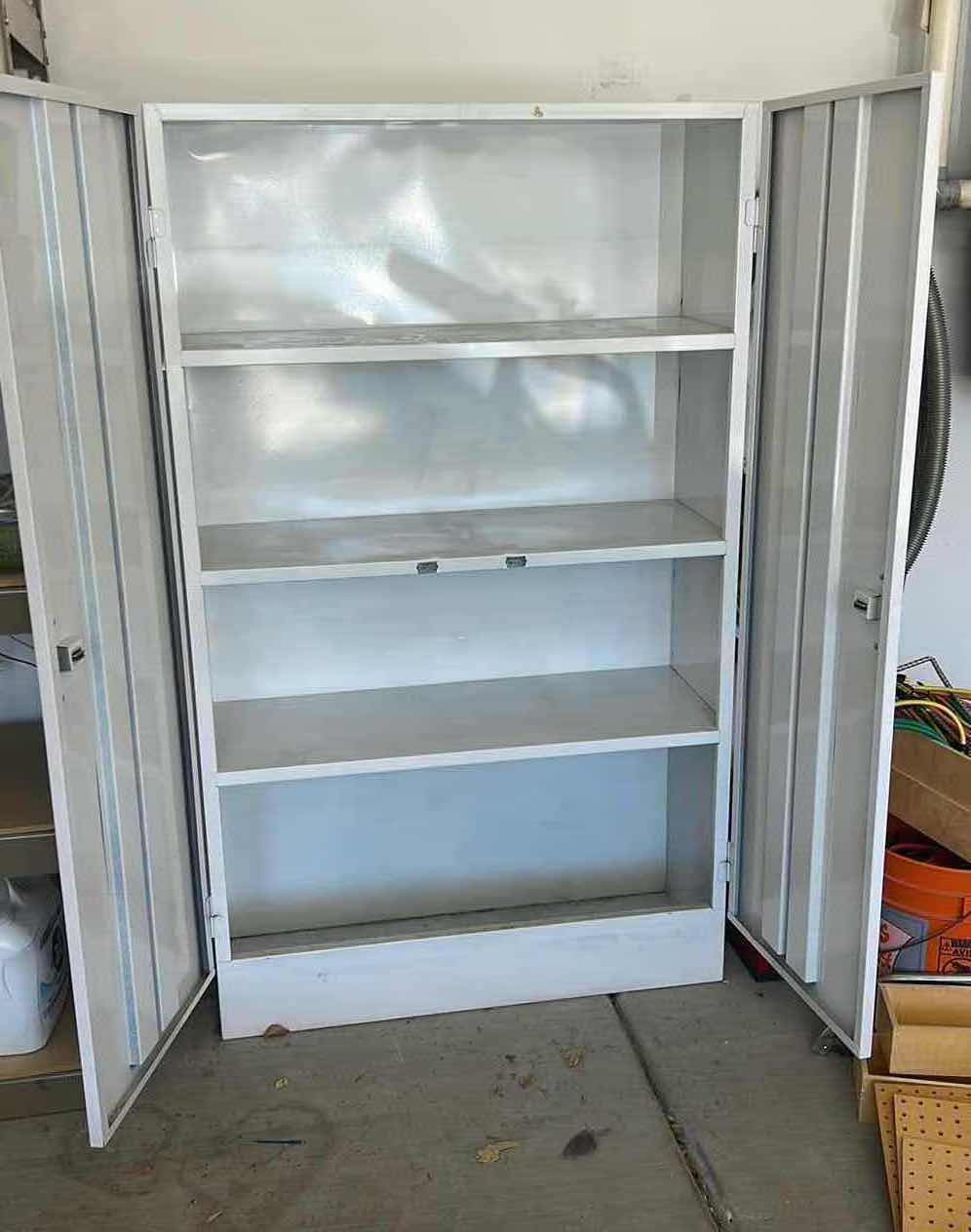 Photo 1 of WHITE METAL STORAGE CABINET 3’ x 15“ X H5‘