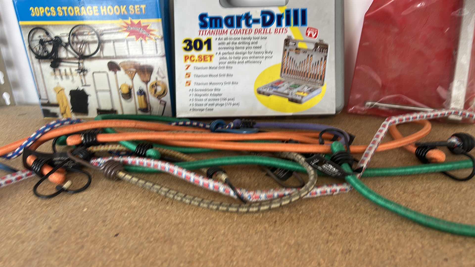 Photo 1 of GARAGE ITEMS – 30 PIECE STORAGE HOOK, SET, SMART DRILL, BASIN, WRENCH, AND BUNGEES