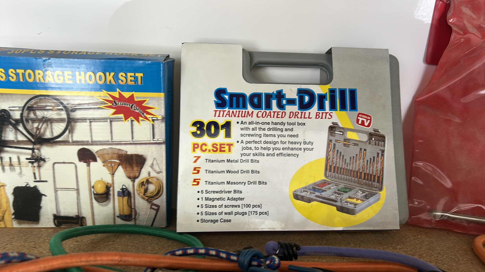 Photo 1 of GARAGE ITEMS – 30 PIECE STORAGE HOOK, SET, SMART DRILL, BASIN, WRENCH, AND BUNGEES