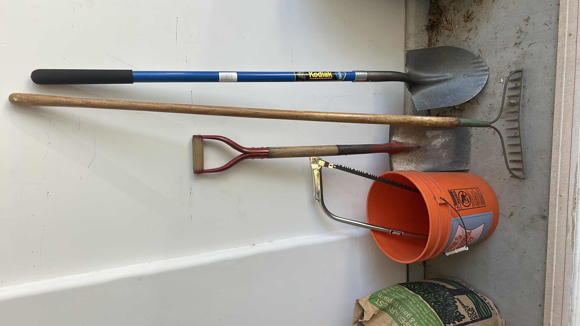 Photo 1 of GARDENING TOOLS – RAKE, SHOVELS, BUCKET, AND MORE