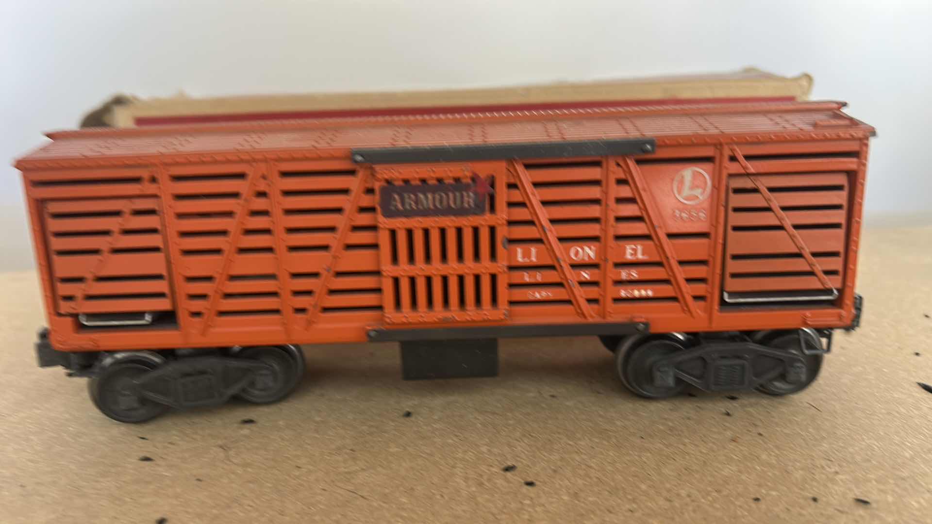 Photo 1 of VINTAGE LIONEL NO. 3656 OPERATING CATTLE CAR, ORIGINALLY MANUFACTURED IN THE POSTWAR ERA AROUND THE MID-1950S. WITH BOX OF COWS