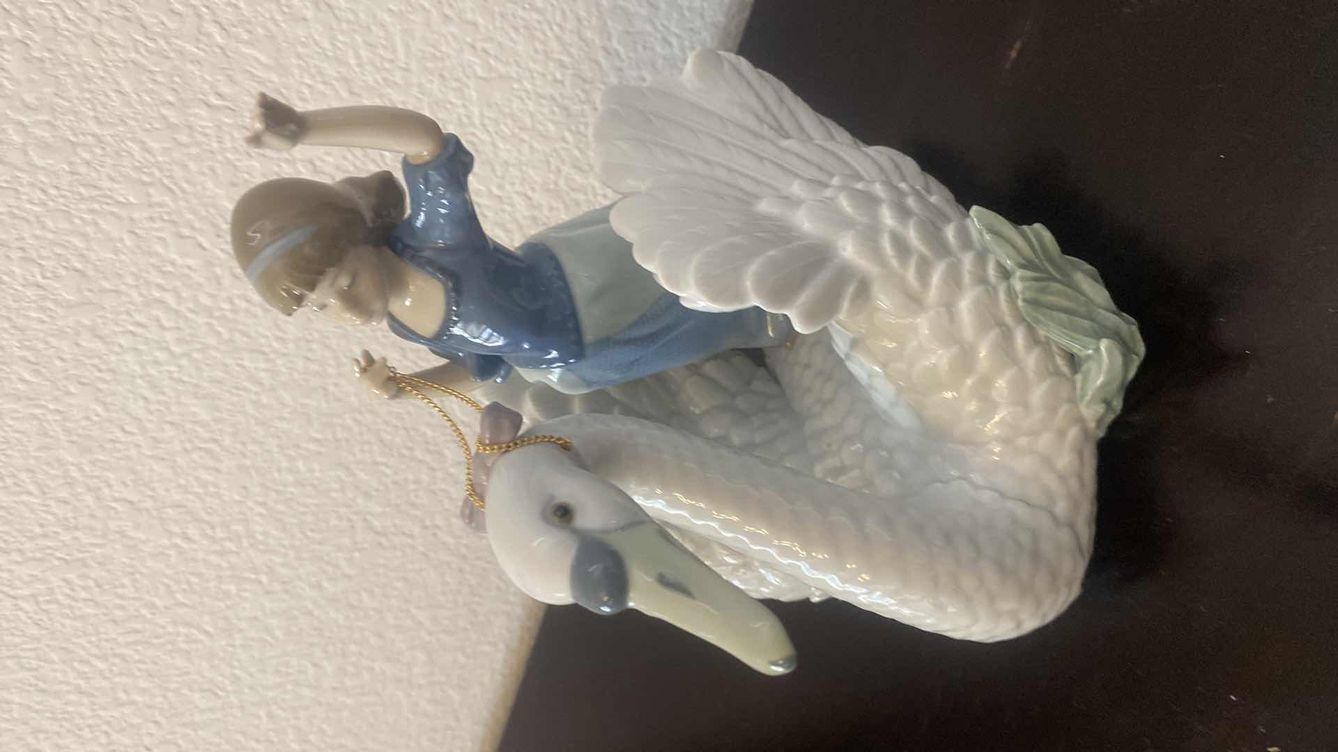 Photo 1 of VINTAGE LLADRO “ THE SWAN AND THE PRINCESS” MODEL 05705  WITH BOX 7 1/2” X 9”