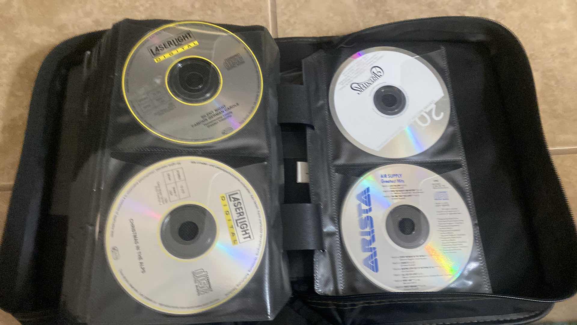 Photo 1 of CASE LOGIC CD WITH ASSORTED CDS