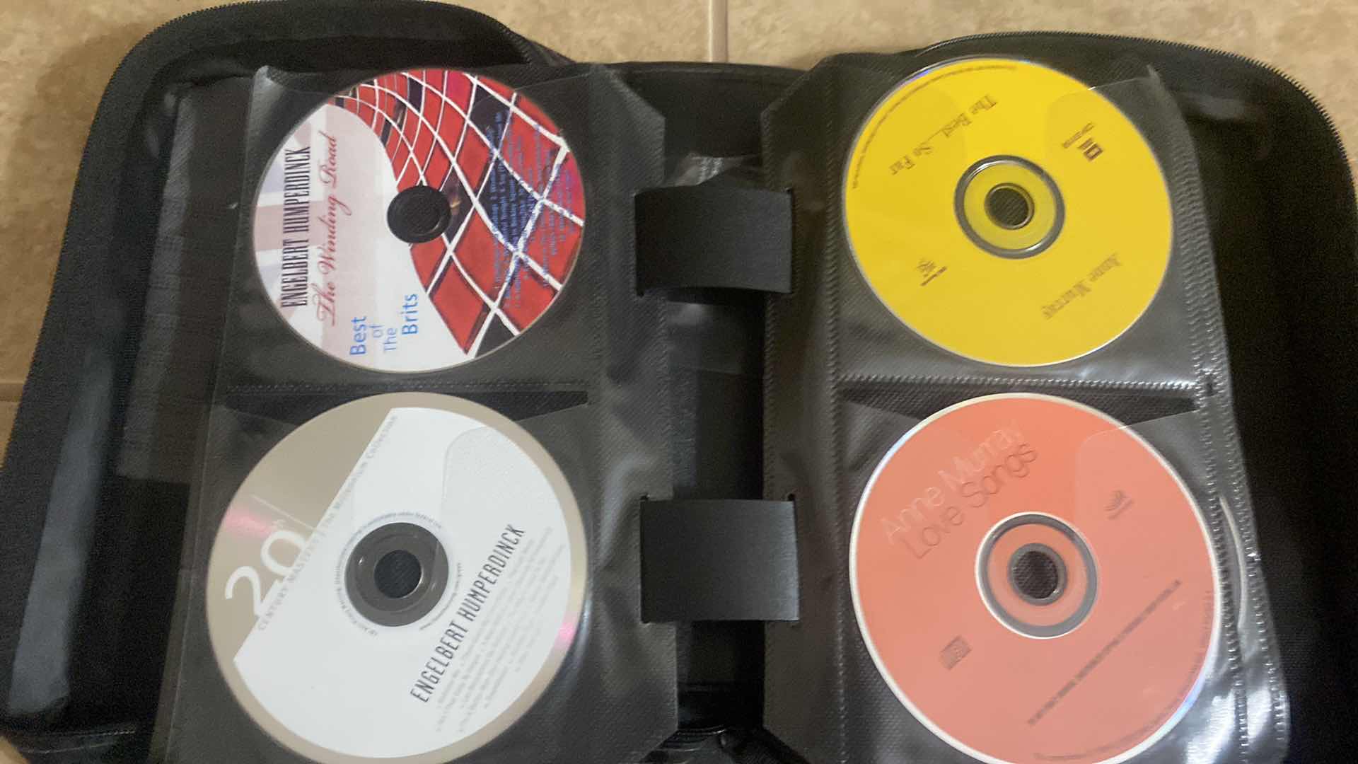 Photo 1 of CASE LOGIC CD WITH ASSORTED CDS