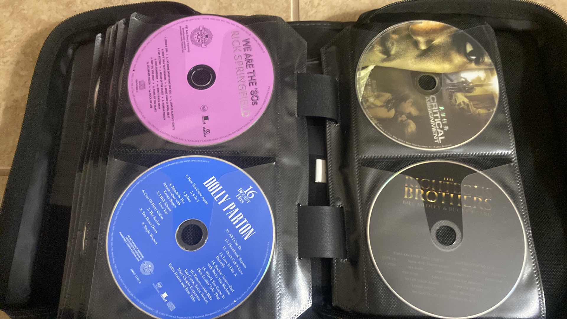 Photo 1 of CASE LOGIC CD WITH ASSORTED CDS
