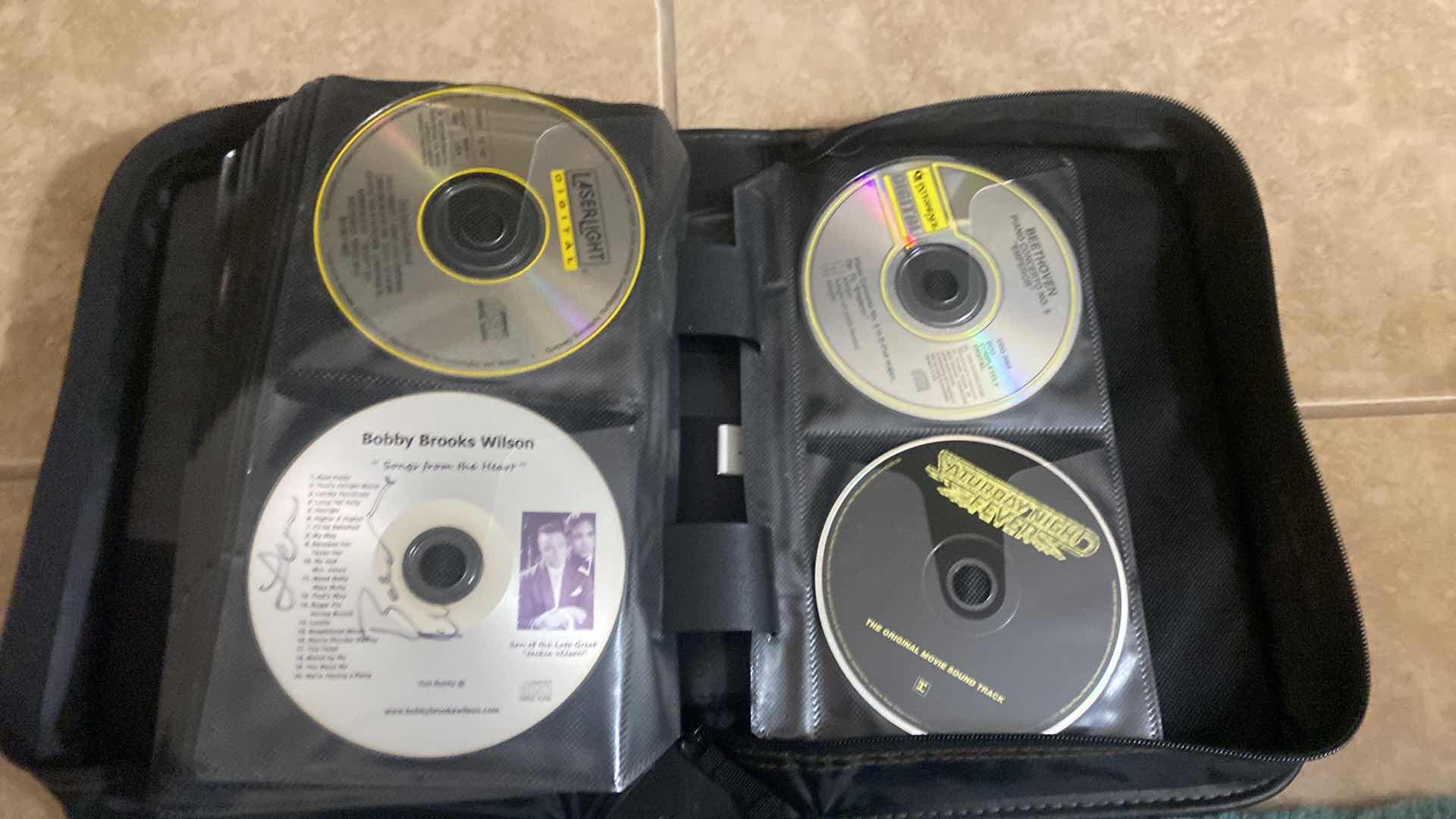 Photo 1 of CASE LOGIC CD WITH ASSORTED CDS