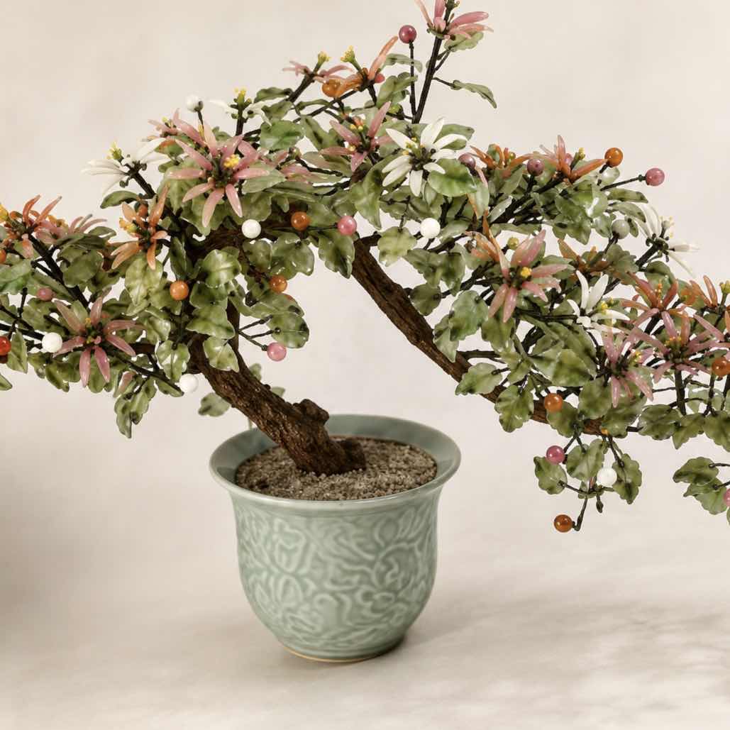 Photo 1 of VINTAGE HANDCRAFTED GEMSTONE BONSAI TREE WITH COLORFUL FLORAL ACCENTS DECORATIVE CELADON-STYLE CERAMIC POT H15”
ESTIMATED RETAIL VALUE: $125 H15”